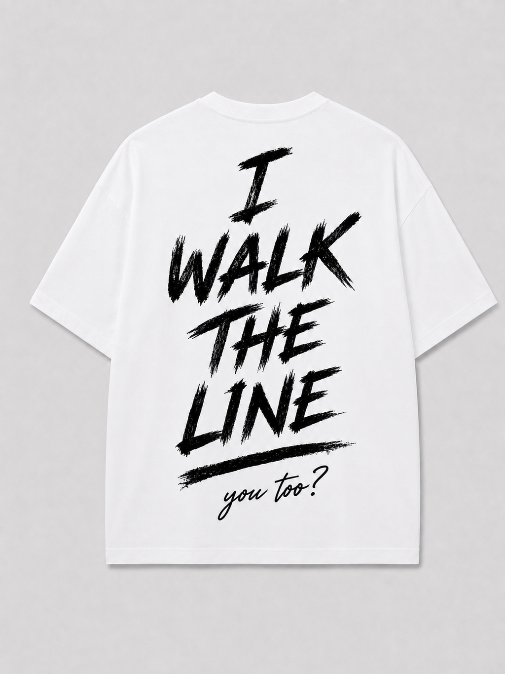 Achterkant van het witte I WALK THE LINE T-shirt van FAKESNIFF, met een geschilderde tekst I WALK THE LINE met daaronder 'you too?' in schuinschrift
