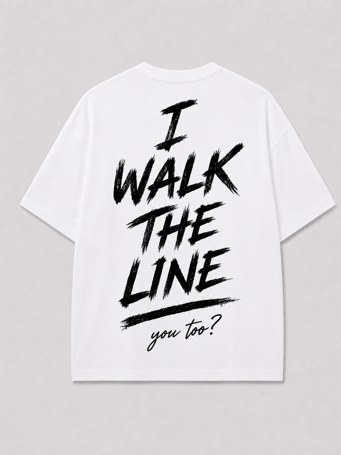 Achterkant van het witte I WALK THE LINE T-shirt van FAKESNIFF, met een geschilderde tekst I WALK THE LINE met daaronder 'you too?' in schuinschrift